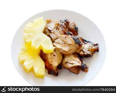 Teriyaki Chicken with fresh pineapple on white dish - Japanese cuisine