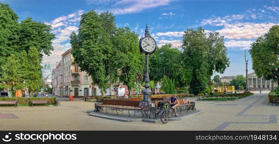 Ternopil, Ukraine 06.07.2021. Tripartite clock on the Taras Shevchenko Boulevard in Ternopil, Ukraine, on a sunny summer morning. Taras Shevchenko Boulevard in Ternopil, Ukraine