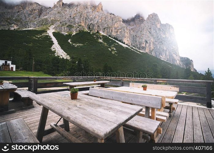 terrace at the Pozza Di Fassa, Dolomites mountains, Italy