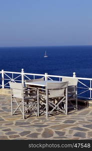 Terrace of white color on the background of ocean on the Mediterranean.