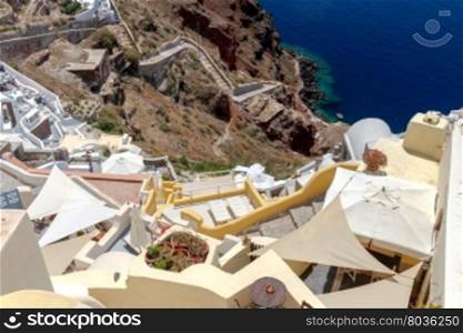 Terraces on the slopes of the volcano in the village Oia. Greece. Santorini.. Beautiful views of the coast from the village Oia on Santorini I