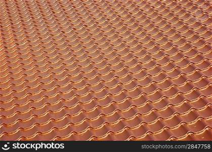 terracotta metal tile roof, background