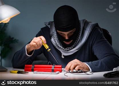 Terrorist bomber preparing dynamite bomb