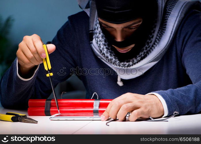 Terrorist bomber preparing dynamite bomb