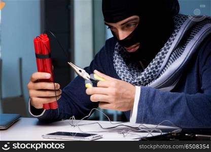 Terrorist bomber preparing dynamite bomb