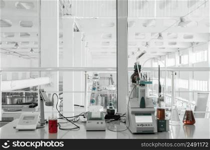 test laboratory and measuring instruments at the plant for the production and processing of plastics. equipment in industrial laboratory