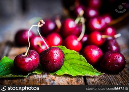 , testiii, Cherries with leafs on wooden table