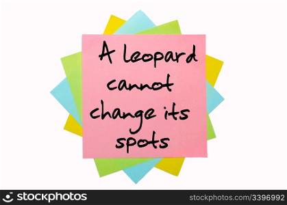 "text "A leopard cannot change its spots" written by hand font on bunch of colored sticky notes"