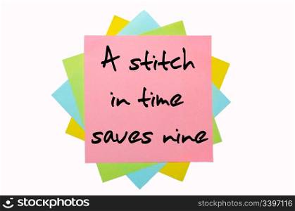 "text " A stitch in time saves nine " written by hand font on bunch of colored sticky notes"