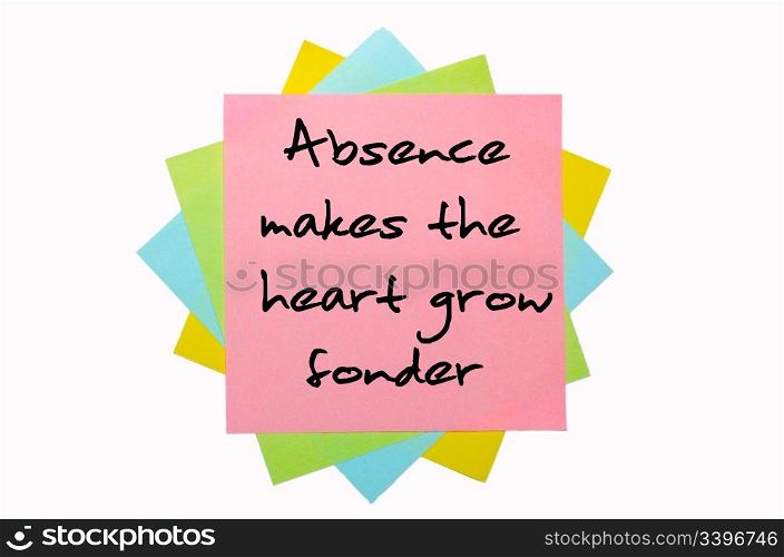 "text "Absence makes the heart grow fonder" written by hand font on bunch of colored sticky notes"