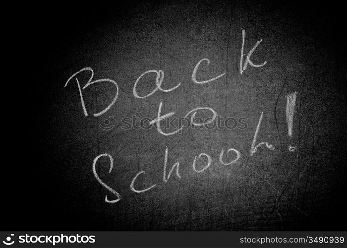 Text &acute;Back to school!&acute; on blackboard
