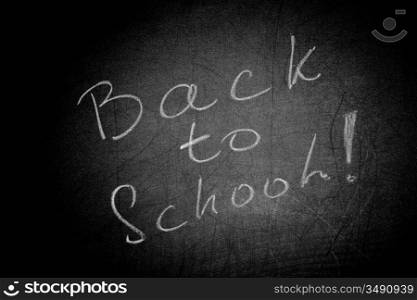 Text &acute;Back to school!&acute; on blackboard