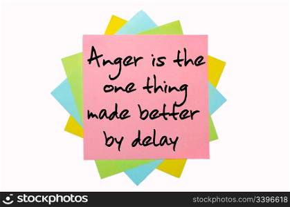 "text "Anger is the one thing made better by delay" written by hand font on bunch of colored sticky notes"