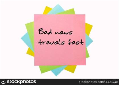 "text "Bad news travels fast" written by hand font on bunch of colored sticky notes"