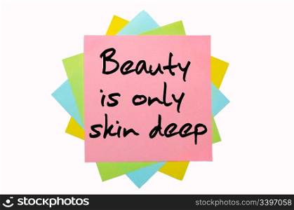 "text "Beauty is only skin deep" written by hand font on bunch of colored sticky notes"