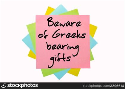 "text "Beware of Greeks bearing giftst" written by hand font on bunch of colored sticky notes"