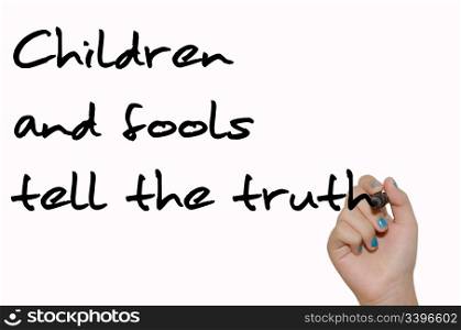 "text "Children and fools tell the truth" black handwrite font on white surface and child&rsquo;s arm holding marker"
