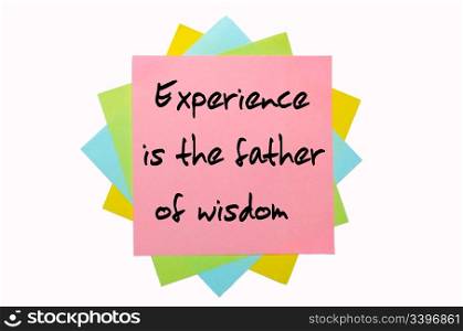 "text " Experience is the father of wisdom " written by hand font on bunch of colored sticky notes"