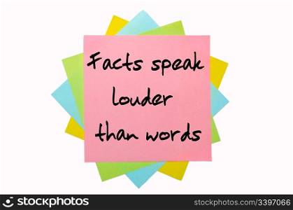 "text " Facts speak louder than words " written by hand font on bunch of colored sticky notes"
