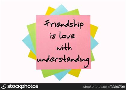 "text " Friendship is love with understanding " written by hand font on bunch of colored sticky notes"