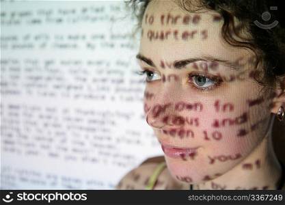 text is projected on face of woman