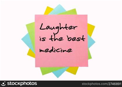 "text "Laughter is the best medicine" written by hand font on bunch of colored sticky notes"