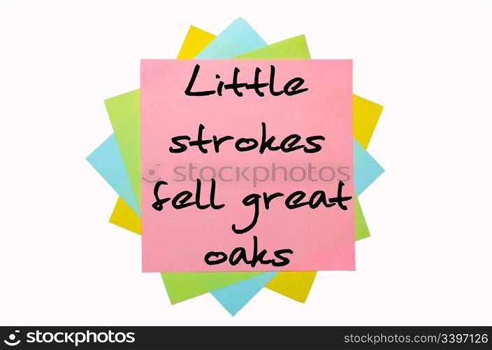 "text "Little strokes fell great oaks" written by hand font on bunch of colored sticky notes"