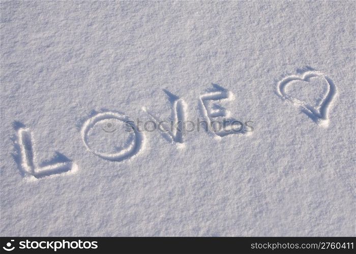 text LOVE on the snow