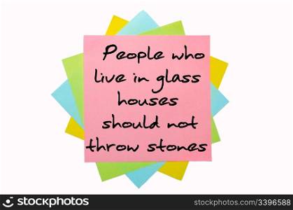 "text "People who live in glass houses should not throw stones" written by hand font on bunch of colored sticky notes"