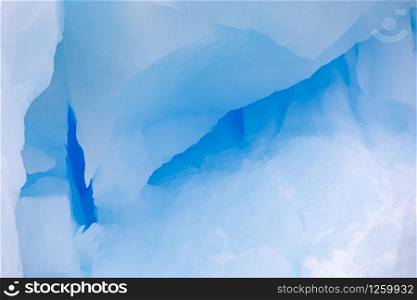 Text space on blue ice with deep canyons and caves in Antarctic glaciers