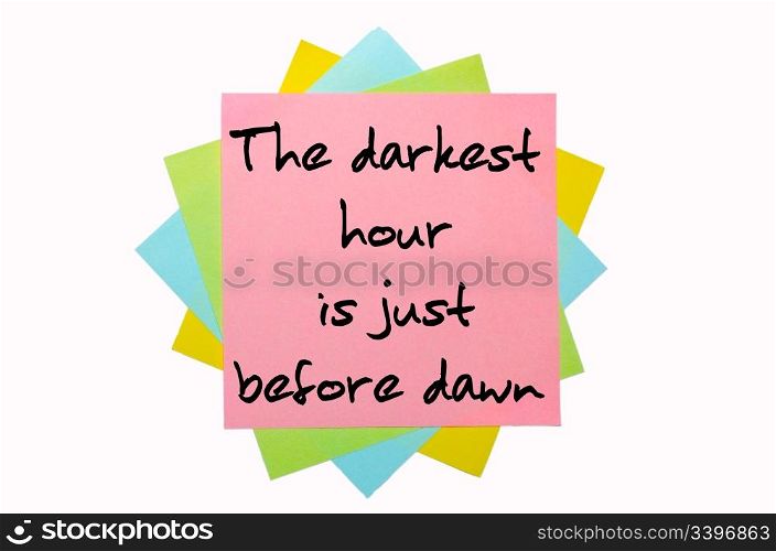 "text " The darkest hour is just before dawn " written by hand font on bunch of colored sticky notes"