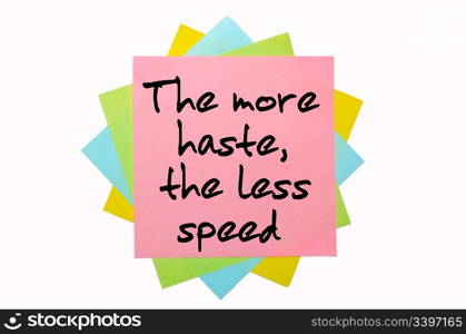 "text " The more haste, the less speed " written by hand font on bunch of colored sticky notes"