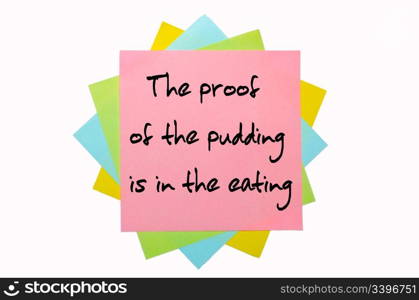 "text " The proof of the pudding is in the eating " written by hand font on bunch of colored sticky notes"
