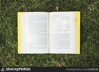 textbook with colorful hardcover meadow