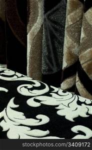Textile carpet mats. Colorful carpets and white shapes