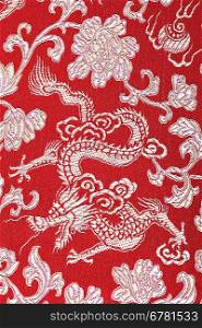 Textile in red with dragon on it