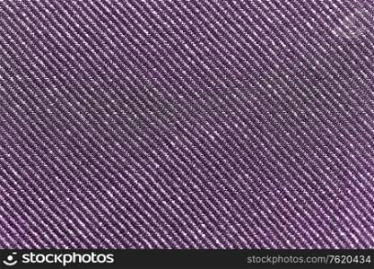 textile, party and texture concept - shimmering violet fabric background. shimmering violet fabric background