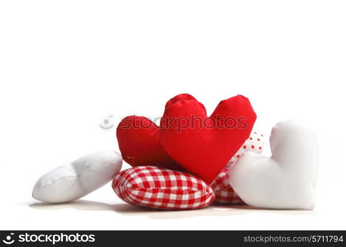 Textile red hearts isolated on white background