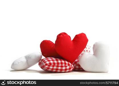 Textile red hearts isolated on white background
