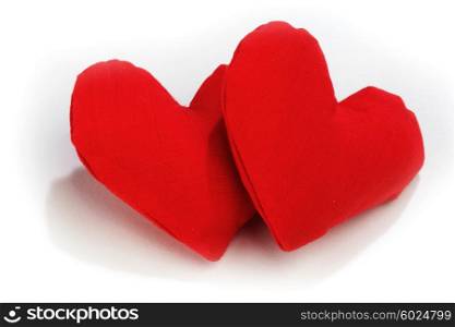 Textile red hearts isolated on white background