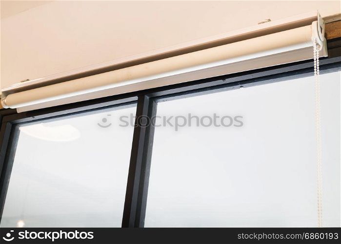 Textile roll curtain window blind, stock photo