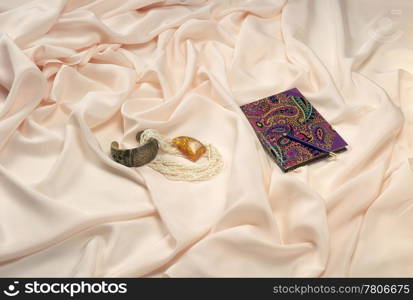Textile satin cover on bed