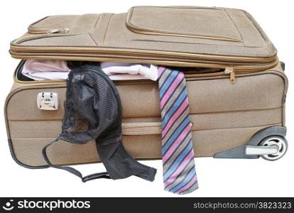 textile suitcase with fell out male tie and female bra isolated on white background