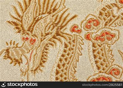 Textile with dragon pattern on it