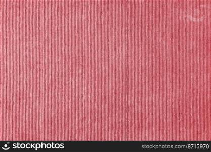 Texture background of velours red fabric. Upholstery velveteen texture fabric, corduroy furniture textile material, design interior, decor. Ridge fabric texture close up, backdrop, wallpaper.. Red velveteen upholstery fabric texture background.