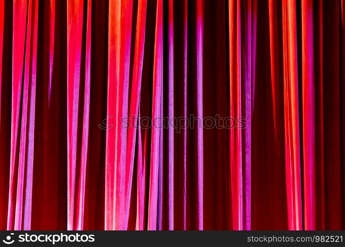Texture background red curtain and shadow of light.