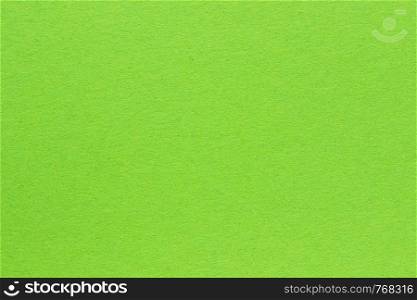 texture dense paper, green color . Background for the designer.
