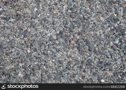 Texture detail of a road pavement with stones