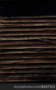 Texture details of an old wooden plunks as background