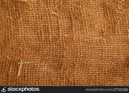 Texture high resolution of brown color of coarse cloth. Close up. Horizontal format.